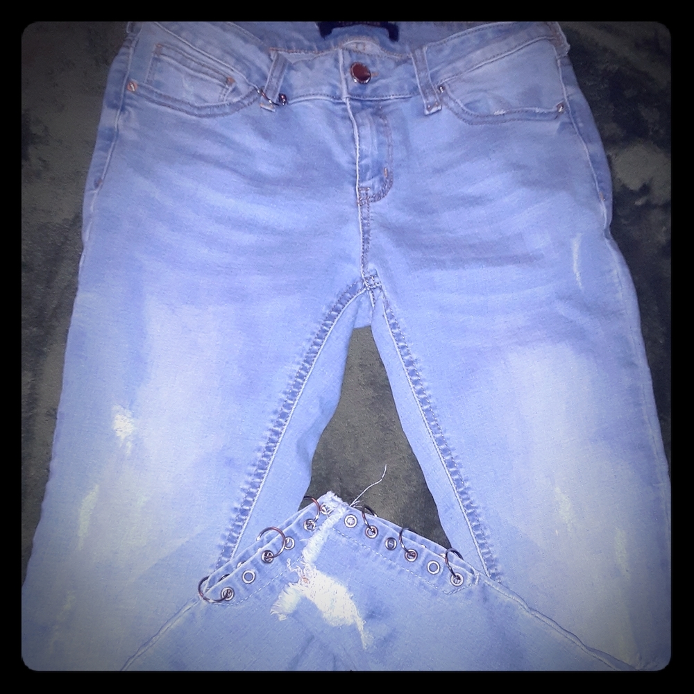A pair of LOS ANGELES WAX jeans